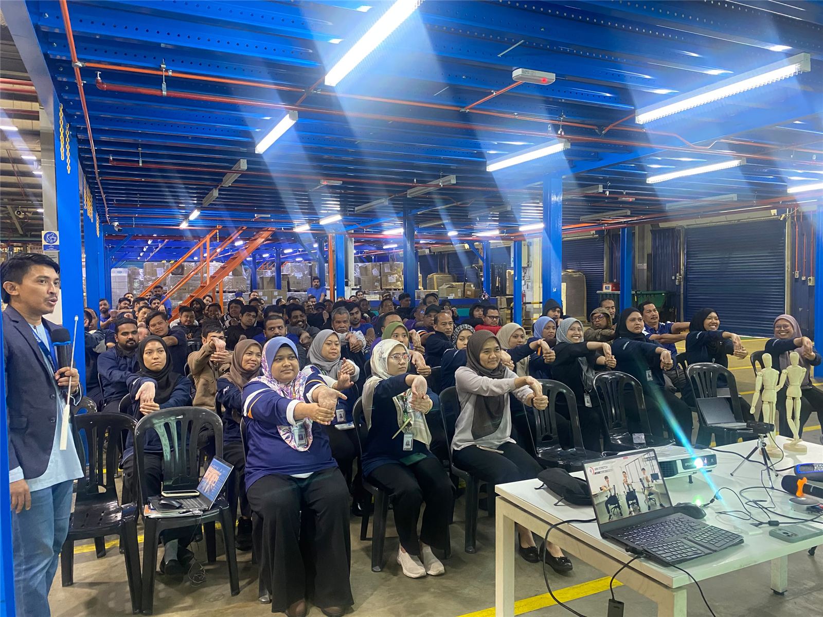 The full Mafar team gathered at a group townhall.